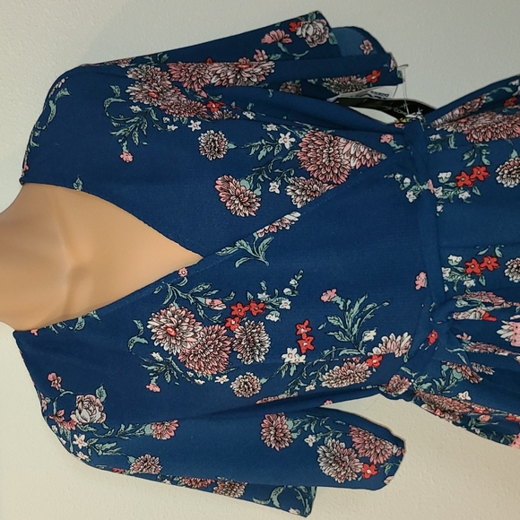 Trixxi Pants - NWOT Dark blue romper Trixxi clthing Co with floral pattern size L